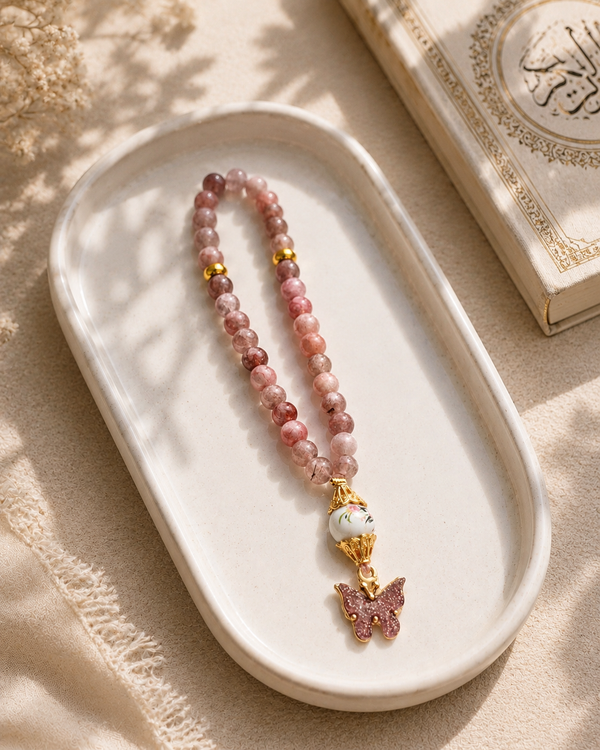 Dune beige natural agate tasbih — 33 prayer beads styled with Quran