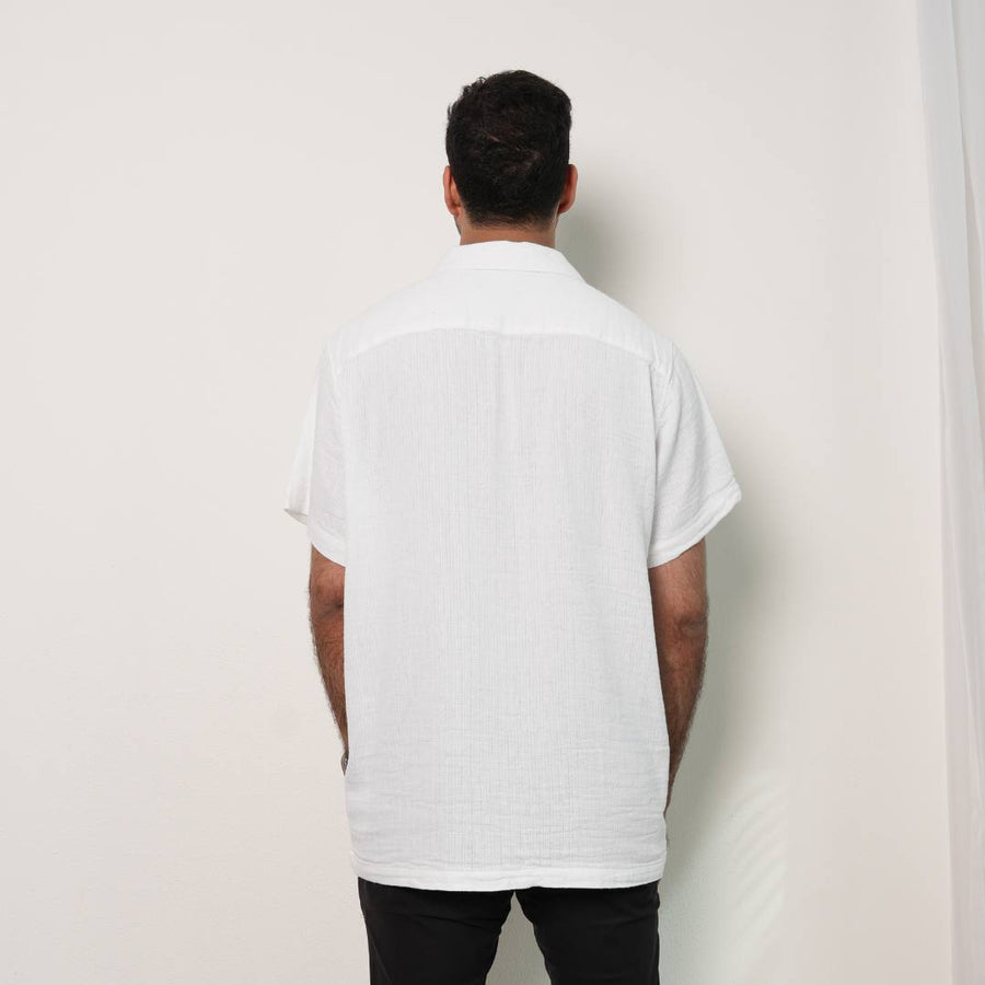 Back view of the Men's Keffiyeh Camp Collar Shirt in white cotton