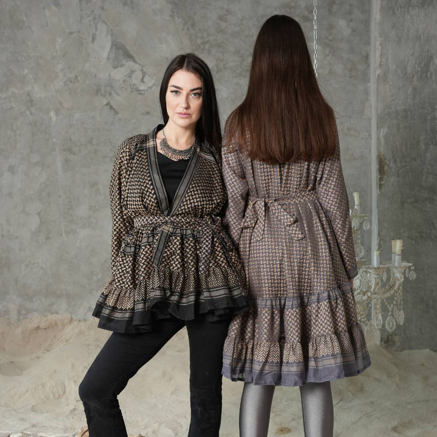 Front and back views of the Keffiyeh Ruffled Babydoll Dress styled over leggings