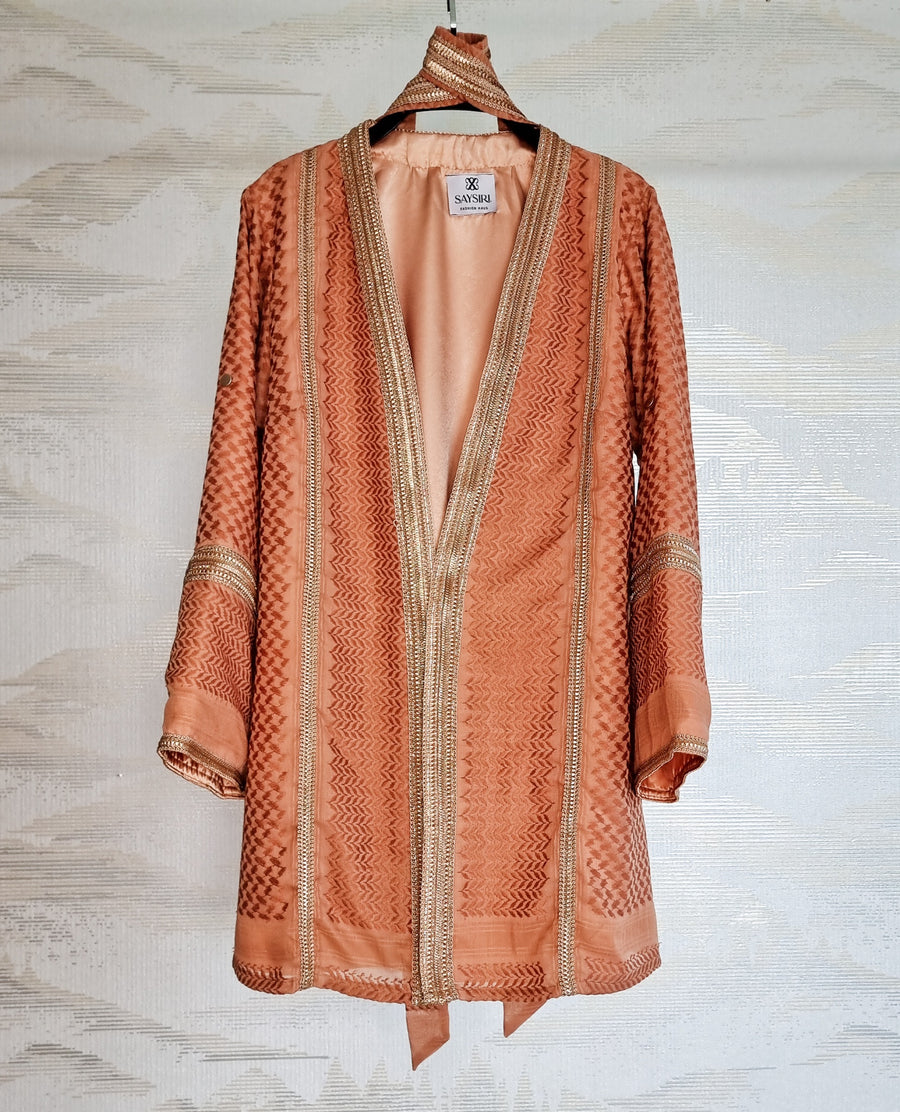 Warm Orange Keffiyeh Kimono hanging open — terracotta cotton ghutrah weave, fully lined modest outerwear