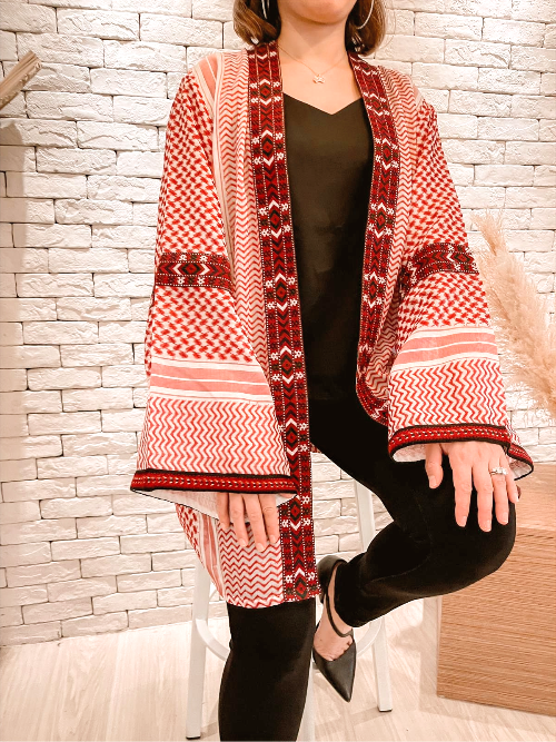 Model styling the Red Keffiyeh Kimono open as modest layering outerwear
