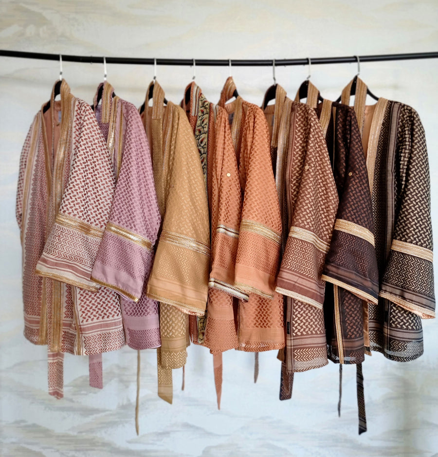 SAYSIRI Keffiyeh Kimono colourway range on a rail — fully lined cotton ghutrah modest outerwear