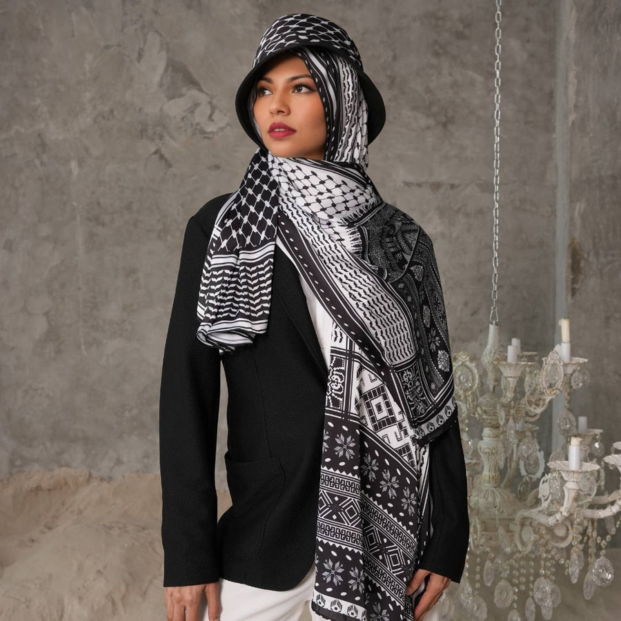 Tatreez Keffiyeh Scarf worn over the shoulders as a modest cover-up