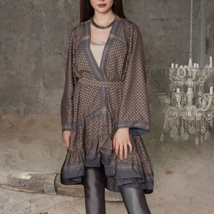 Keffiyeh Ruffled Midi Dress styled with the matching belt over leggings