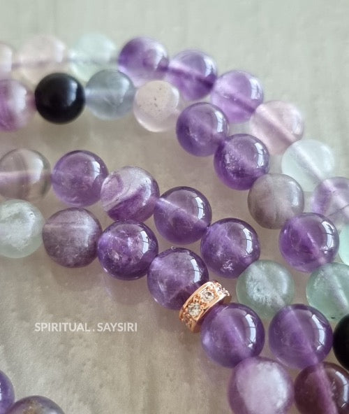 Close-up of natural fluorite gemstone beads on the 99-bead tasbih