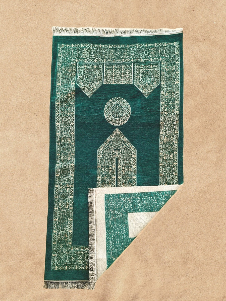 Emerald Green Mecca prayer mat folded to show the soft underside