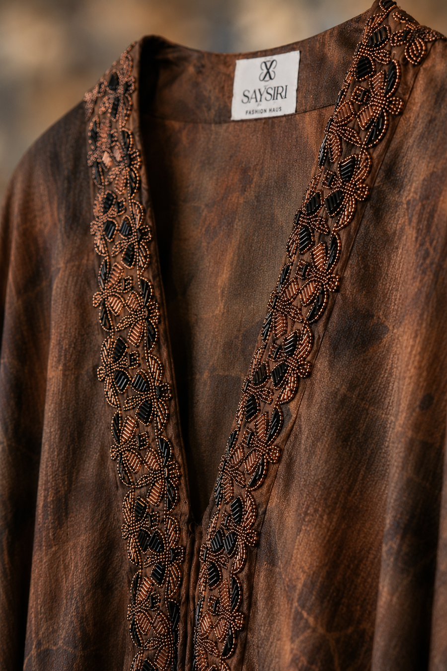 Trim detail on the Brown Butterfly Kaftan