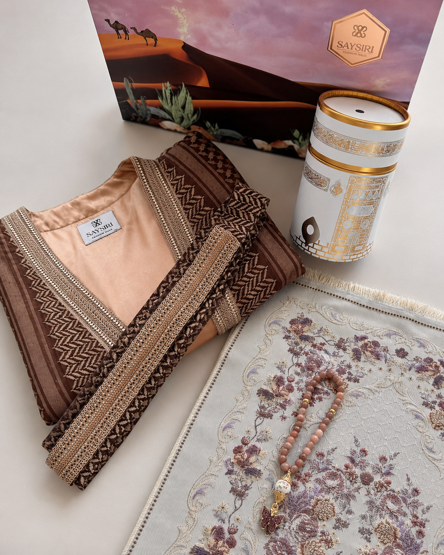 Solidarity Gift Set contents — kimono, inner slip, gold tumbler, prayer mat and beads with gift box