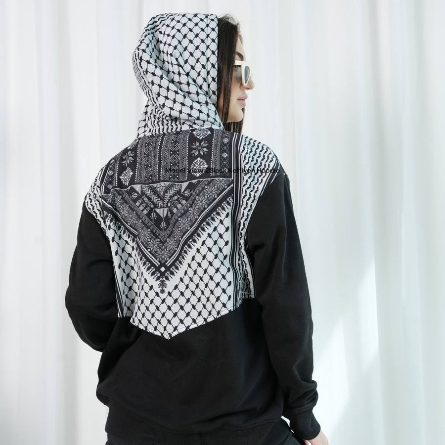 Black Keffiyeh Hoodie back view with tatreez hood detail and sunglasses