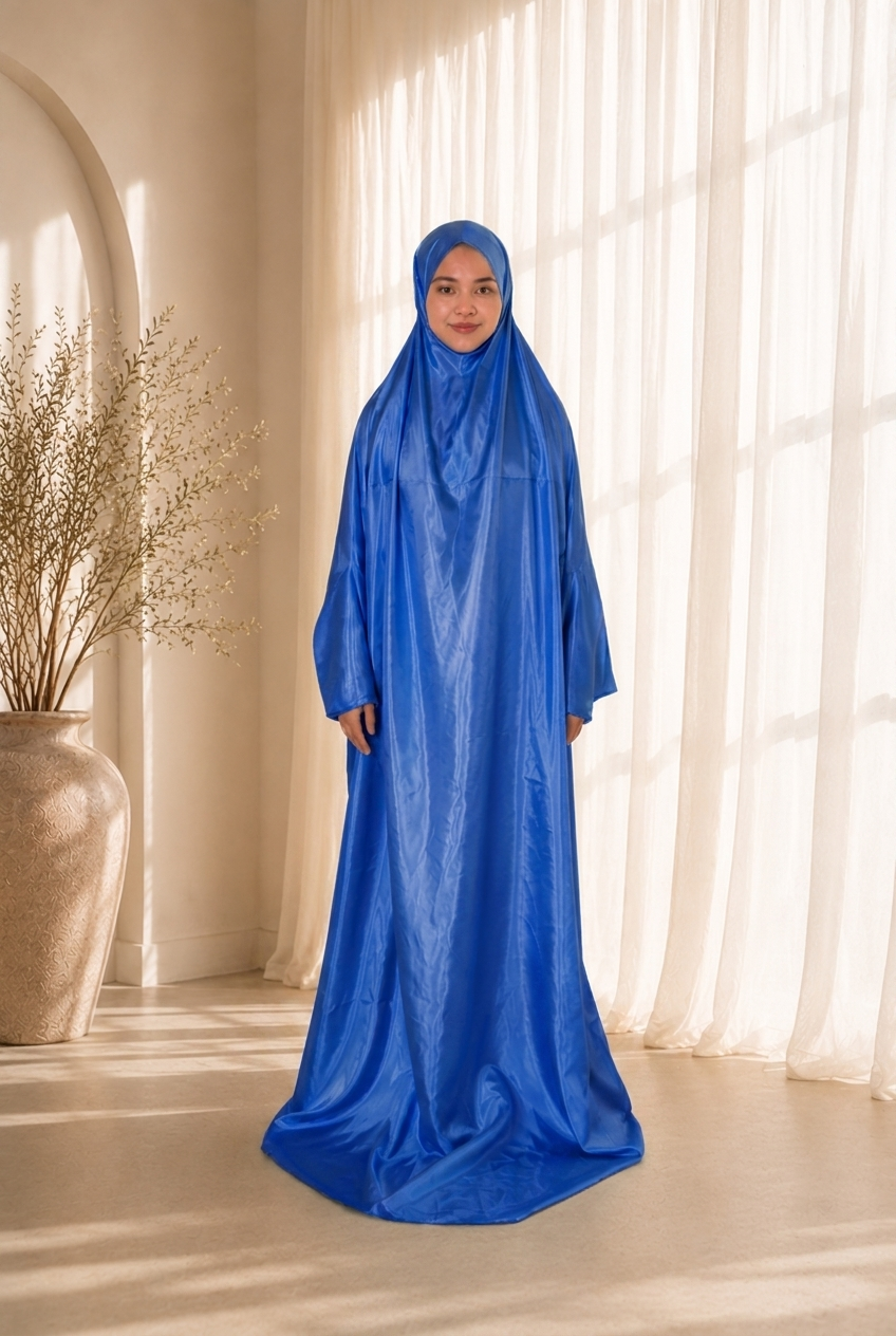 Sakina Gift Set prayer dress in Royal Blue satin, worn by model. Lifestyle visualisation — digitally created