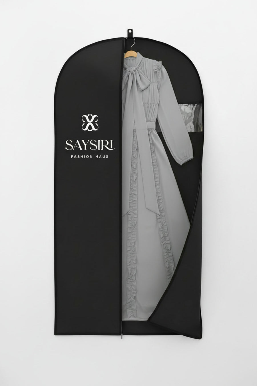The Dove Ethereal Edit dress presented in SAYSIRI gift-ready garment bag packaging.