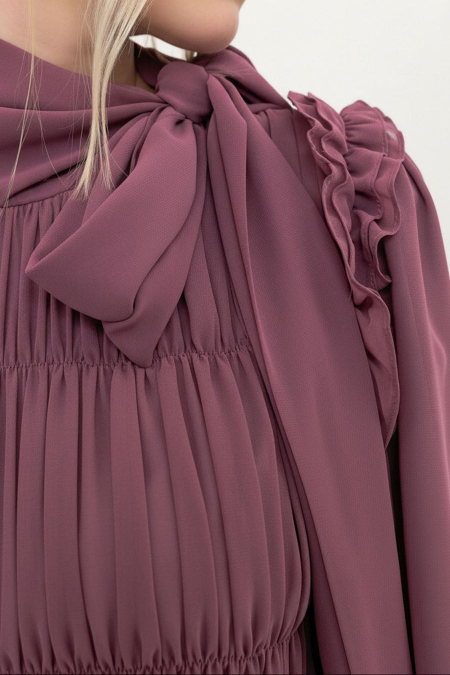 Close-up of the Plum Ethereal Edit dress showing the chiffon fabric texture and deep plum jewel tone.