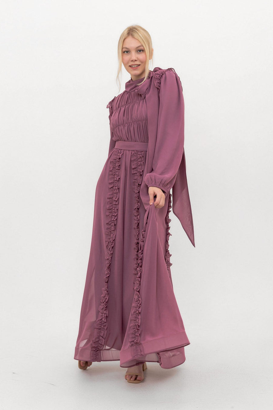 Model wearing the Ethereal Edit chiffon modest dress in deep Plum, full-length front view showing the modest cut and elegant drape.