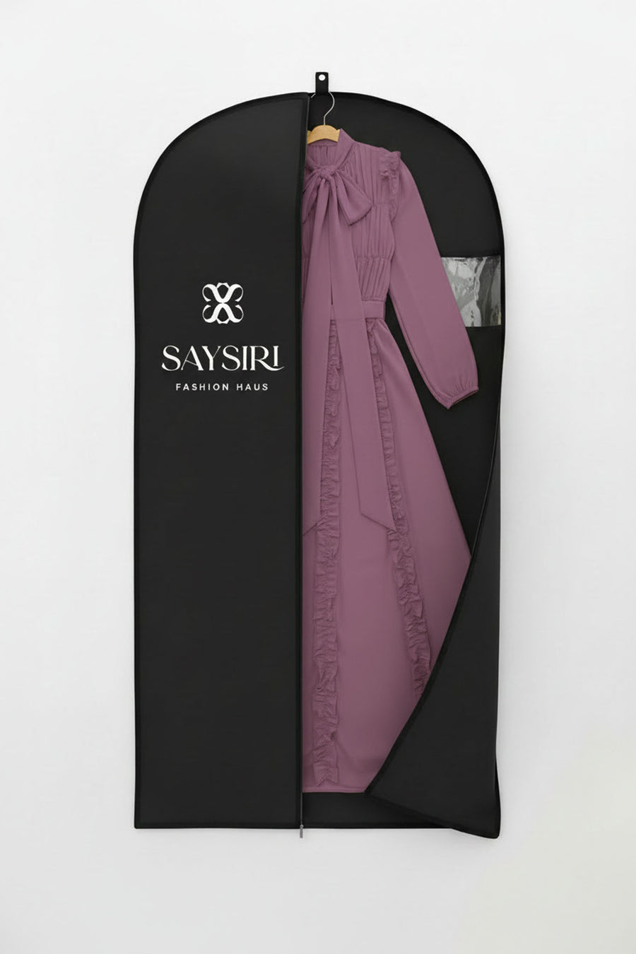The Plum Ethereal Edit dress presented in SAYSIRI gift-ready garment bag packaging.