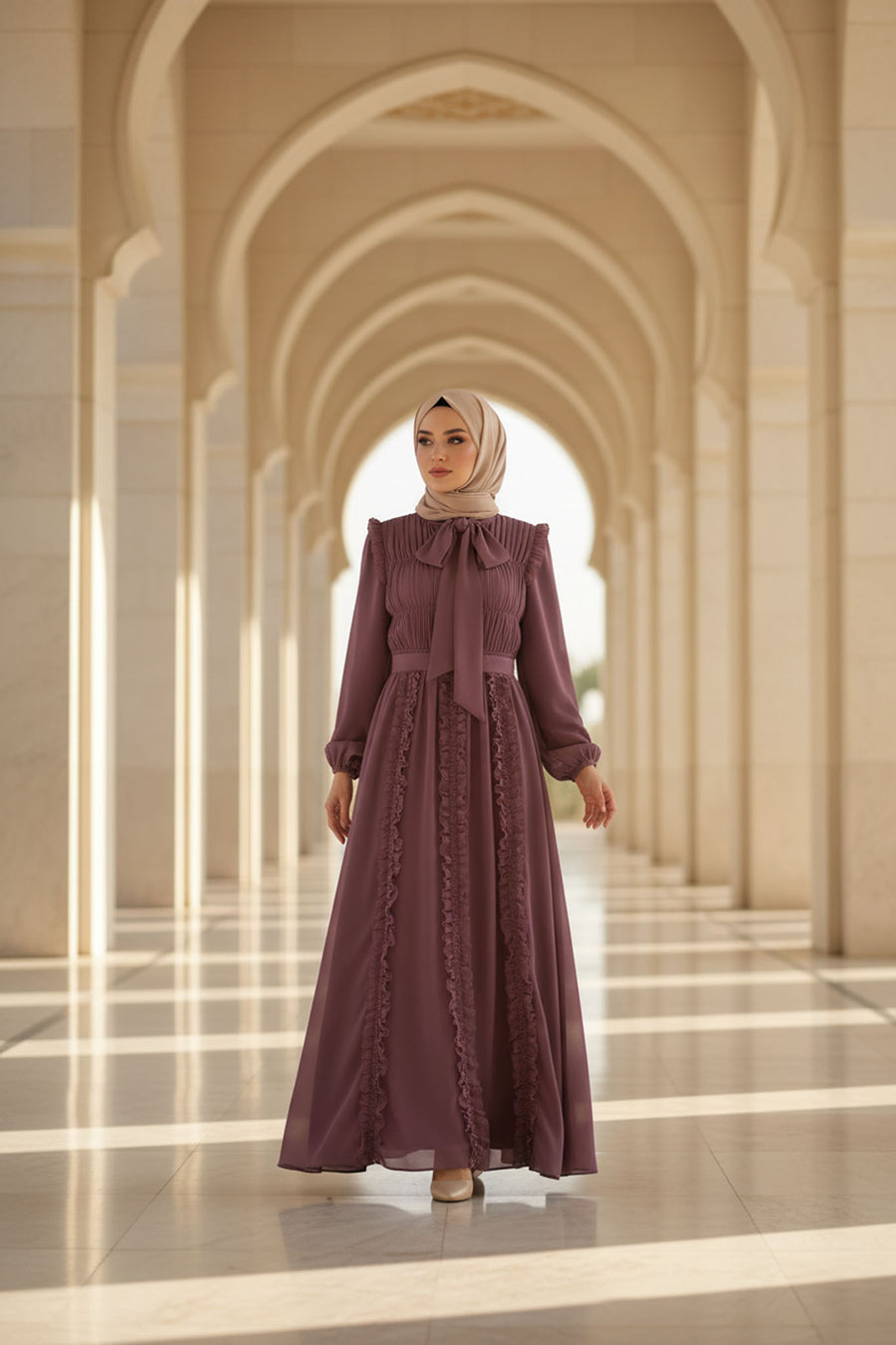Lifestyle image of the Plum Ethereal Edit dress in motion, capturing the fluid movement and jewel-toned richness of the chiffon.