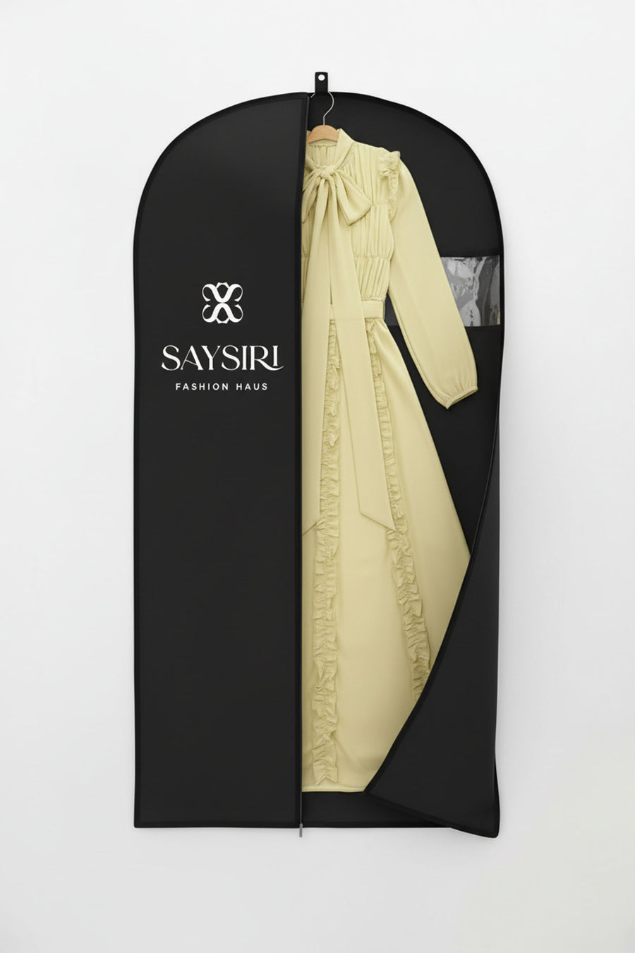 The Primrose Ethereal Edit dress presented in SAYSIRI gift-ready garment bag packaging.