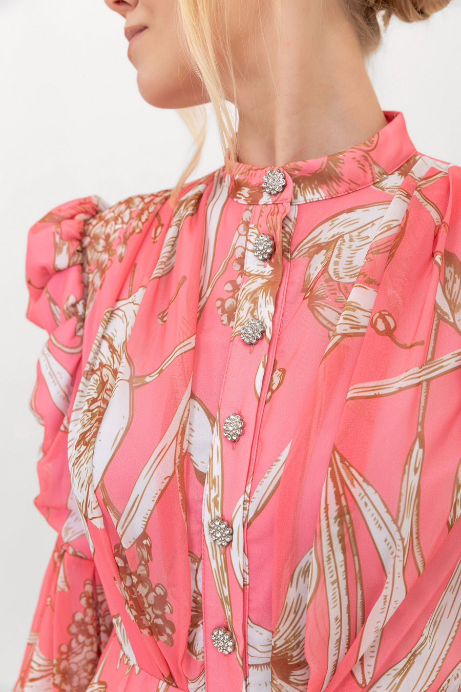 Close-up of the buttons and hand-drawn floral print on The Bloom Edit dress in Coral Pink.