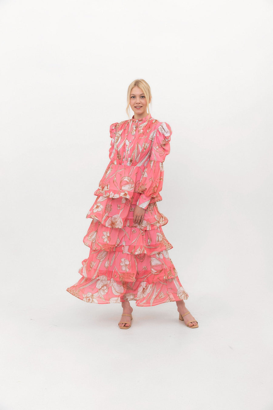 The Bloom Edit tiered chiffon dress in Coral Pink, full-length front view.